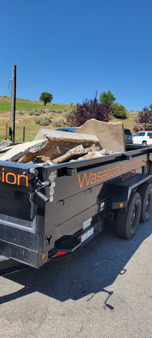 Wasatch Demolition trailer loaded with construction debris for haul-off in Park City, UT